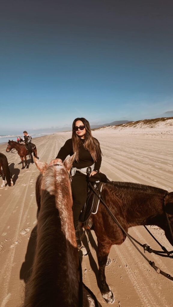 Looking for unique things to do in Florianopolis? Check out my experience horseback riding through the dunes and wild trails of Moçambique Beach! Prices, tips, and review.